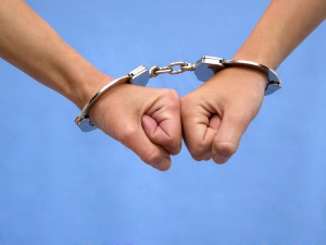 Two Hands In Handcuffs